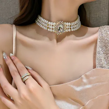 Корейската версия на новата мода с кристалалми и диаманти многорядное перлена огърлица-дамски колиета индивидуалност ретро преувеличенная ключица